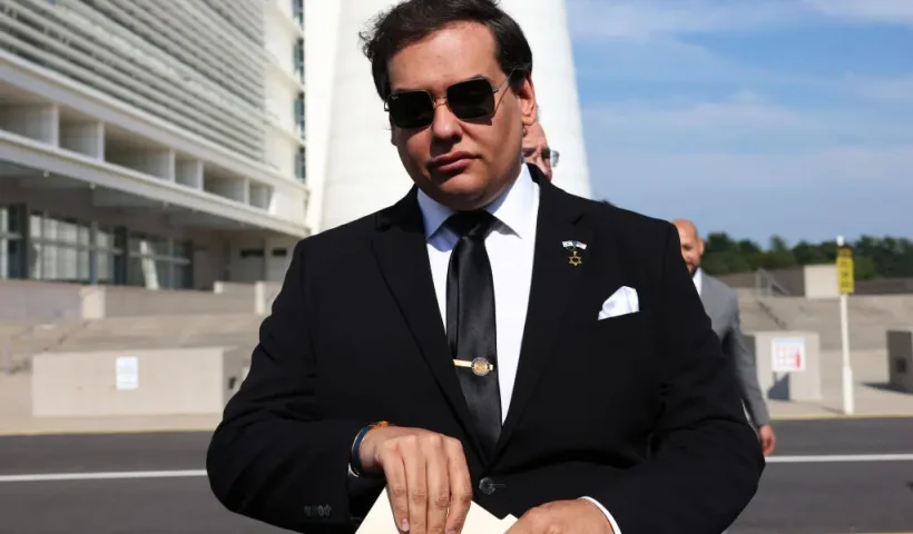 WEST ISLIP, NEW YORK - AUGUST 19: Former U.S. Rep. George Santos prepares to give a statement after a court hearing on August 19, 2024 in West Islip, New York. Santos pleaded guilty to wire fraud and aggravated identity theft weeks before his federal trial was set to begin. His sentencing has been scheduled for February 7, and he faces more than six years in prison under federal sentencing guidelines. Santos owes at least $370,000 in restitution. He was expelled from Congress in 2023, becoming the sixth member in the chamber’s history to be ousted by colleagues. (Photo by Michael M. Santiago/Getty Images)