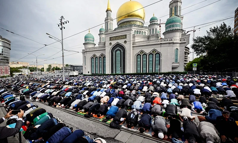 Muslim devotees offer Eid al-Adha prayers at a mosque in Moscow on June 28, 2023. (Photo by Alexander NEMENOV / AFP) (Photo by ALEXANDER NEMENOV/AFP via Getty Images)