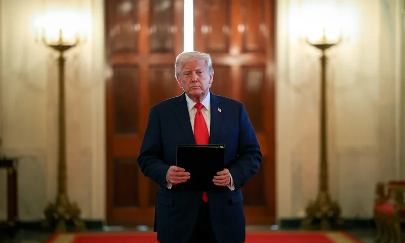 WASHINGTON, DC - APRIL 15: U.S. President Donald Trump arrives for a presentation ceremony for the Commander-in-Chief Trophy to the U.S. Naval Academy in the East Room of the White House on April 15, 2025 in Washington, DC. The Commander-in-Chief Trophy is awarded to the winner of the American college football series among the teams of the U.S. Military Academy (Army Black Knights), the U.S. Naval Academy (Navy Midshipmen), and the U.S. Air Force Academy (Air Force Falcons). (Photo by Win McNamee/Getty Images)