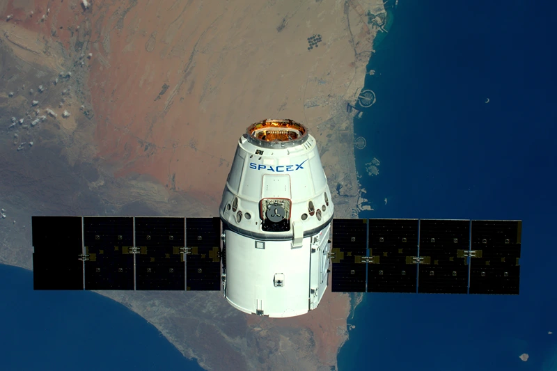 IN SPACE - APRIl 10: (EDITORIAL USE ONLY) (NO SALES) This handout image supplied by the European Space Agency (ESA), shows a view of The Palms, Dubai as the SpaceX Dragon spacecraft psses below, in an image taken by ESA astronaut Tim Peake from the International Space Station on April 10, 2016. ESA astronaut Tim Peake is performing more than 30 scientific experiments and taking part in numerous others from ESA's international partners during his six-month mission, named Principia, after Isaac Newtons ground-breaking Naturalis Principia Mathematica, which describes the principal laws of motion and gravity. (Photo by Tim Peake / ESA/NASA via Getty Images)