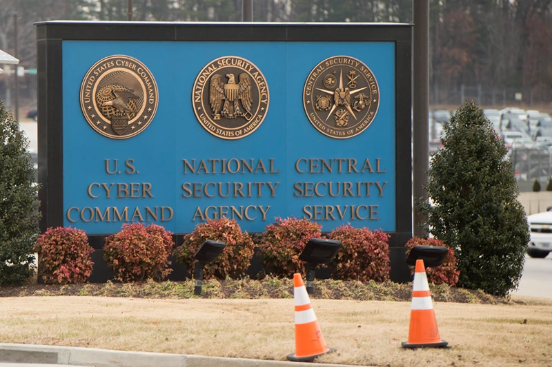 A sign for the National Security Agency (NSA), US Cyber Command and Central Security Service, is seen near the visitor's entrance to the headquarters of the National Security Agency (NSA) after a shooting incident at the entrance in Fort Meade, Maryland, February 14, 2018. (Photo by SAUL LOEB / AFP) (Photo by SAUL LOEB/AFP via Getty Images)